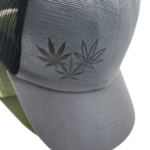 Close up of black three cannabis leaf design on grey hemp novelty snapback hat